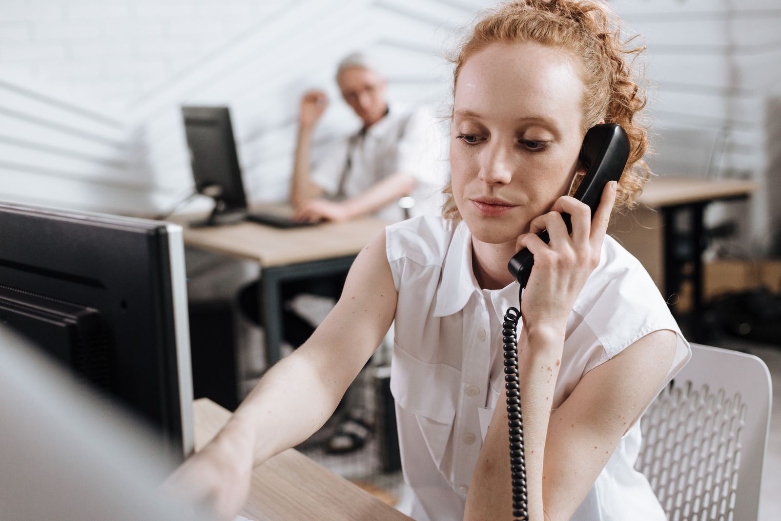 HVAC technician receiving dispatched service call details on mobile phone